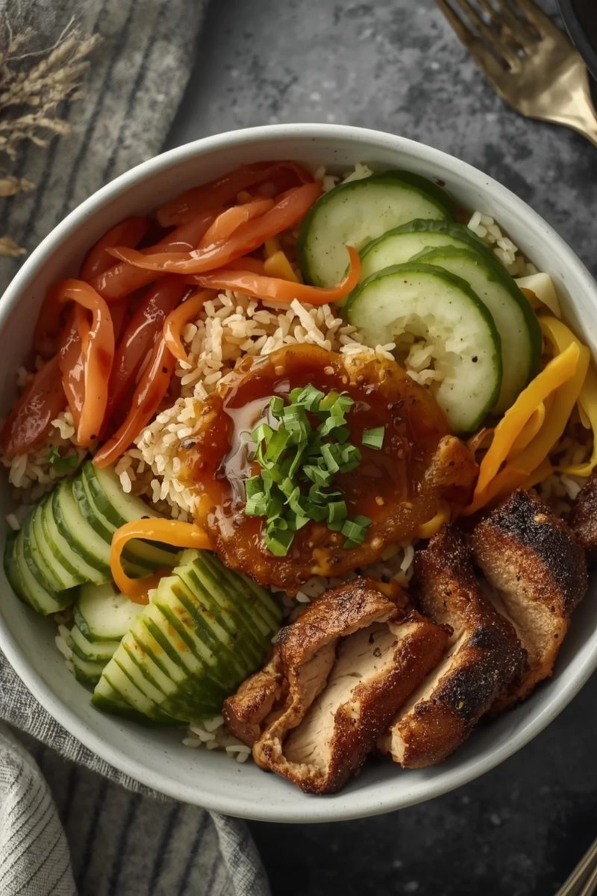 Complete Asian meal featuring homemade chopped almonds Asian sauce with rice and vegetables